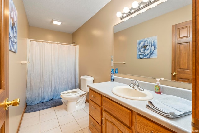 bathroom featuring vanity, tile patterned floors, toilet, a textured ceiling, and curtained shower