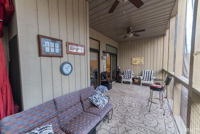 sunroom / solarium with ceiling fan