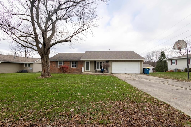 ranch-style house with central AC, a garage, and a front lawn