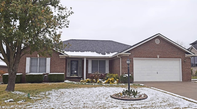 ranch-style house featuring a garage