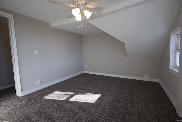 bonus room featuring carpet flooring, vaulted ceiling, and ceiling fan