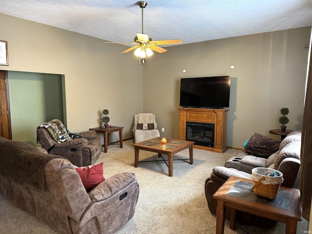 3020 10 Oclock Rd, Bloomingdale, IN 47832 - living area featuring light carpet, a ceiling fan, a textured ceiling, a glass covered fireplace, and baseboards