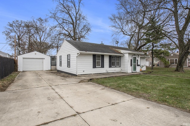 ranch-style home featuring an outbuilding, a front yard, and a garage