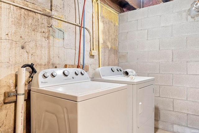 laundry room featuring separate washer and dryer