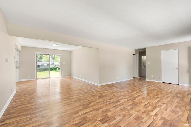 unfurnished living room featuring light wood-type flooring