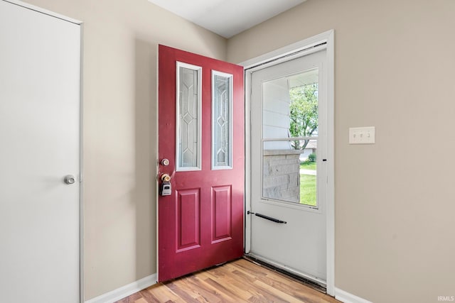 foyer with light wood-type flooring