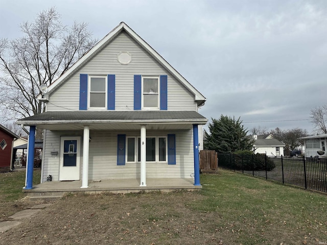 view of front of home featuring a porch and a front yard