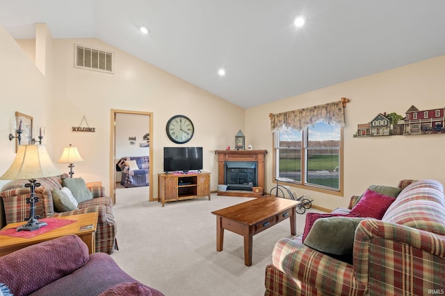 carpeted living room with lofted ceiling