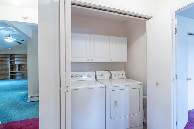 washroom with carpet flooring, ceiling fan, cabinets, a baseboard radiator, and washer and clothes dryer