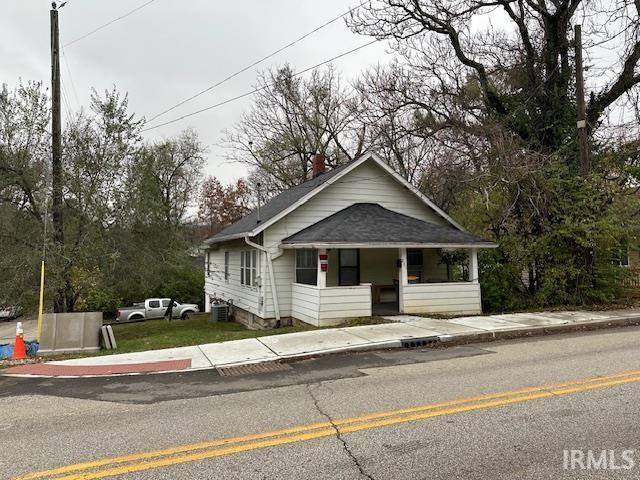 bungalow-style home featuring covered porch