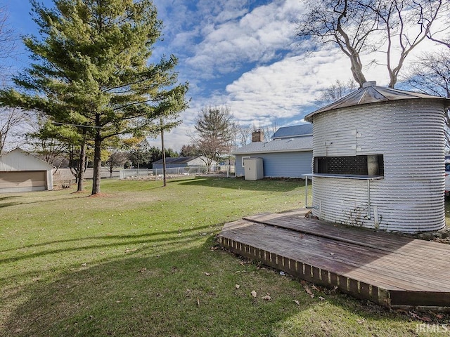 view of yard featuring a wooden deck