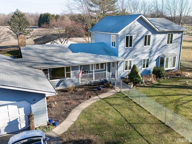 view of front facade with a porch and a front yard