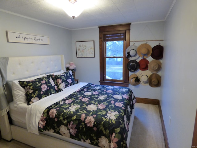 bedroom featuring carpet floors and ornamental molding