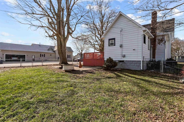 view of yard featuring a wooden deck