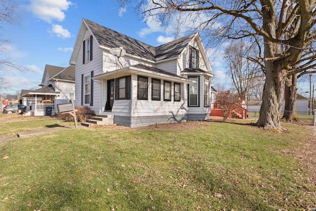 view of home's exterior with a yard