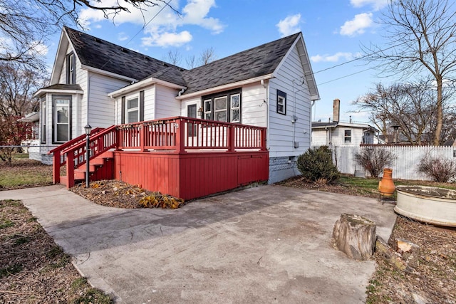 exterior space featuring a patio and a deck