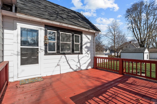 deck featuring a storage shed