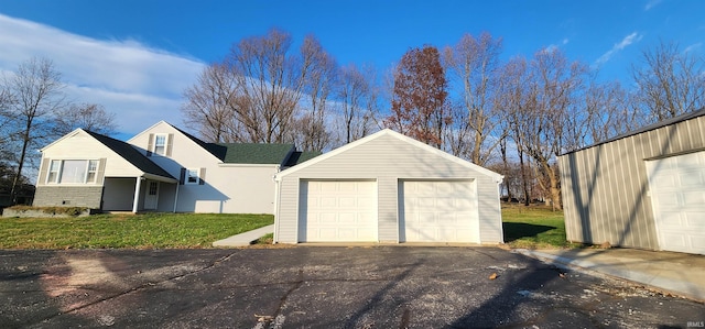 garage featuring a yard