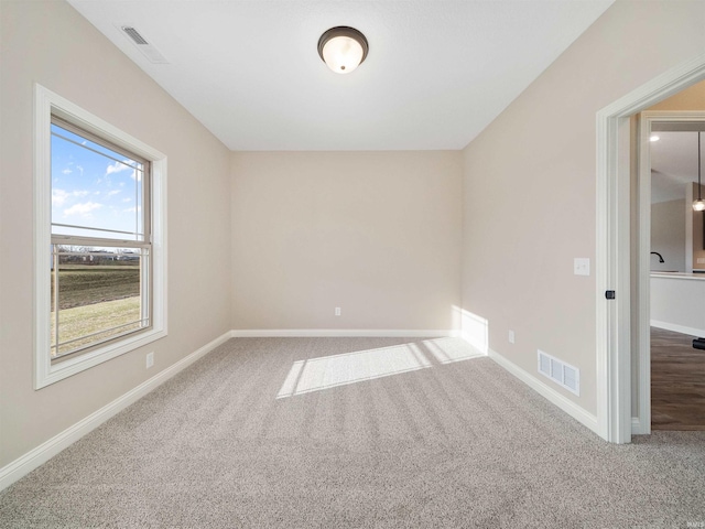 view of carpeted spare room