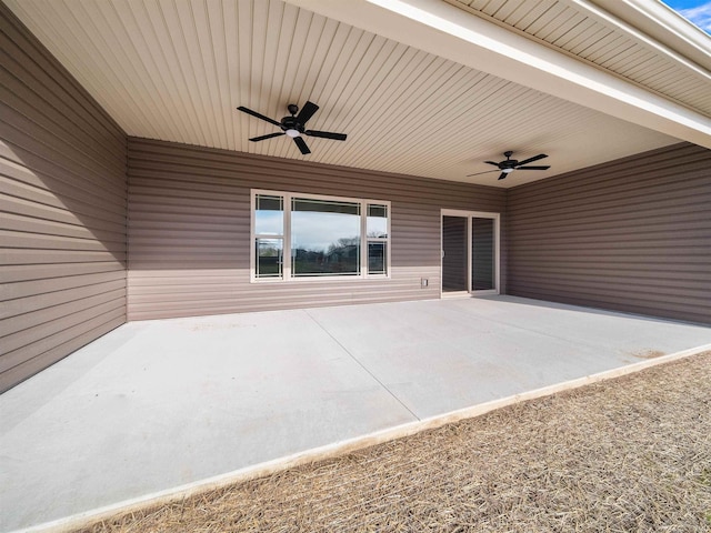 view of patio featuring ceiling fan