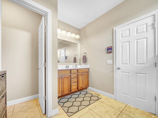 bathroom featuring tile patterned floors and vanity