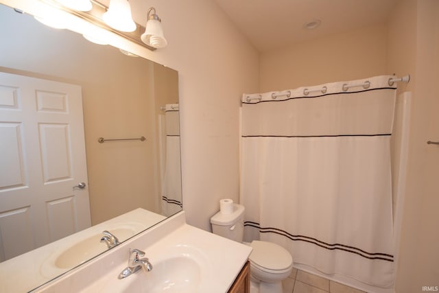 bathroom with toilet, tile patterned flooring, a shower with curtain, and vanity