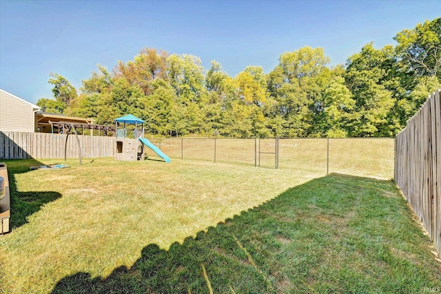 view of yard with a playground