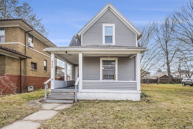 view of front of house featuring a porch and a front lawn