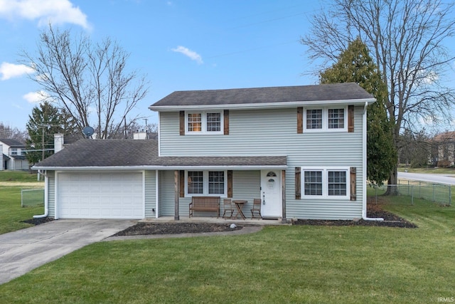 view of front facade with covered porch, a front yard, and a garage