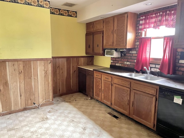 kitchen with sink and black dishwasher