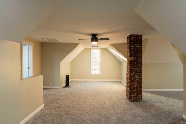 bonus room featuring ceiling fan, carpet, and lofted ceiling