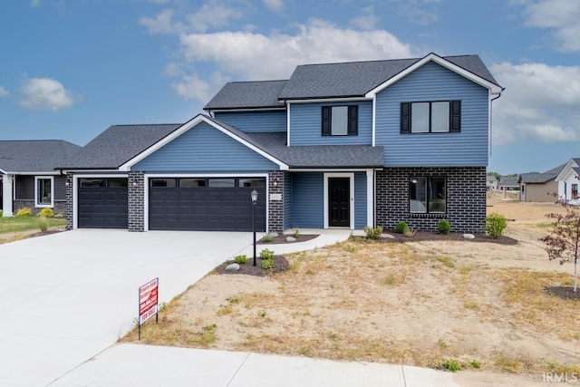 view of front of property with a garage