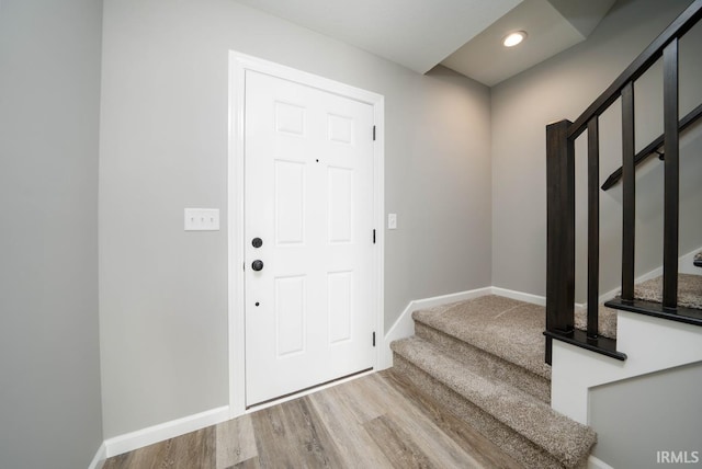 entrance foyer featuring wood-type flooring