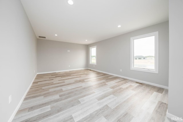 empty room featuring light hardwood / wood-style floors