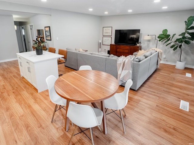 dining room featuring light wood-type flooring