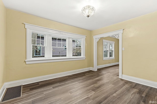 empty room featuring hardwood / wood-style floors