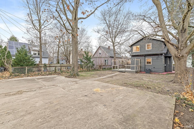 view of yard featuring a deck and a patio area