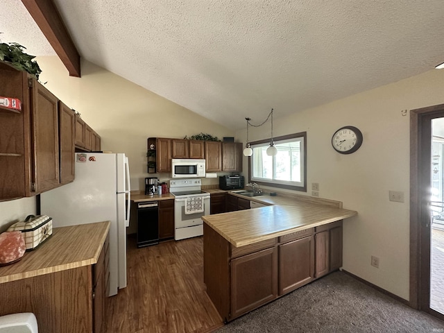 kitchen featuring kitchen peninsula, white appliances, sink, vaulted ceiling with beams, and hanging light fixtures