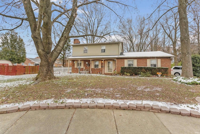 front of property featuring a porch