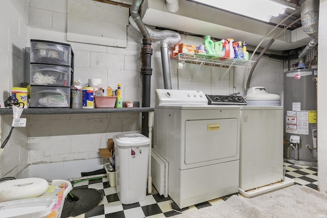 laundry area with washer and clothes dryer and gas water heater