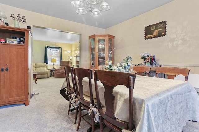 dining area with light carpet