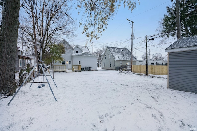 view of yard layered in snow