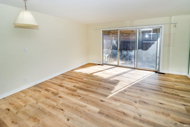 empty room with light wood-type flooring