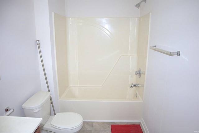 full bathroom featuring tile patterned floors, vanity, washtub / shower combination, and toilet