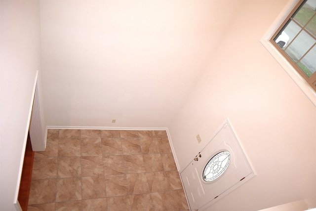 washroom with light tile patterned floors