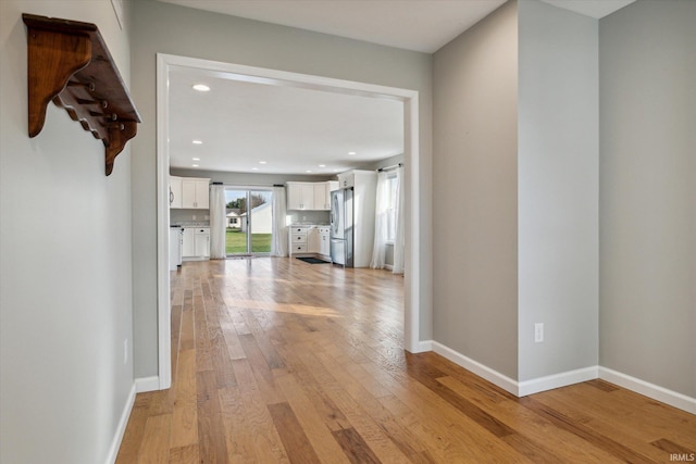 hallway featuring light hardwood / wood-style floors