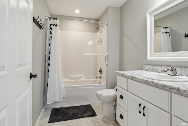 full bathroom featuring toilet, shower / bath combo, vanity, and tile patterned floors