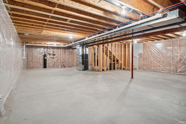 basement featuring heating unit