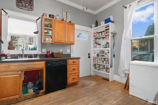 kitchen featuring sink, crown molding, light wood-type flooring, and black dishwasher