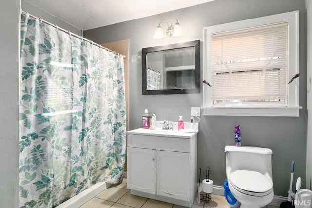 bathroom featuring a shower with curtain, tile patterned flooring, vanity, and toilet